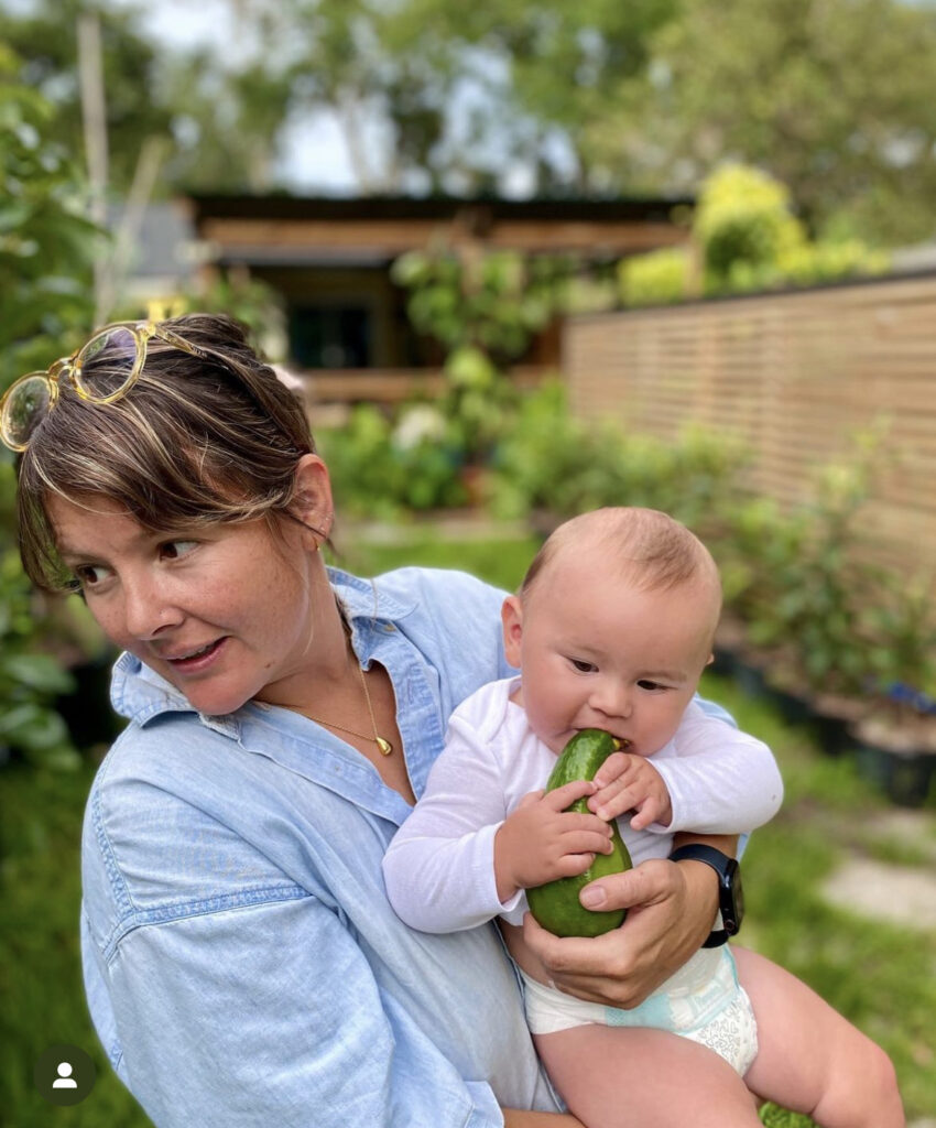 Mrs. Rebel Farms and baby Q pick their first avocado of the season